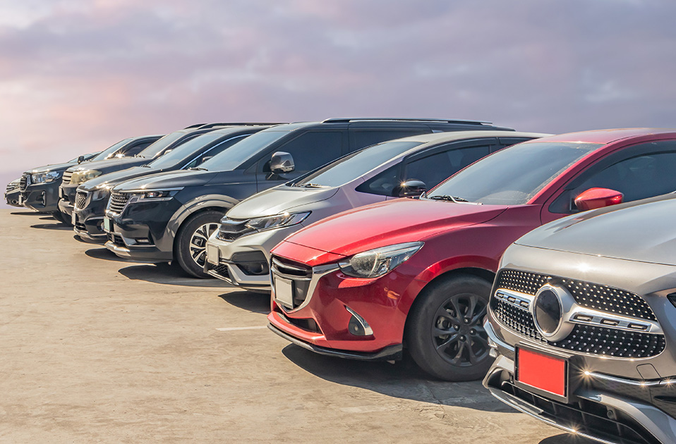 series of parked electric vehicles